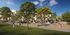 Vibrant community park scene with families enjoying outdoor activities amid lush greenery and modern amenities.Amenity building located at 1800 Santa Carolina Road in Chula Vista, California.
