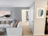 Apartment living room with hallway leading to bedroom at Aladdin Village in Derry, NH