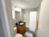 Updated apartment bathroom with vanity, tub, and shower at Aladdin Village in Derry, NH