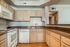 A3 785 sqft Kitchen with white appliances. n, TX 77064A3 785 sqft