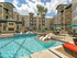Sparkling Pool with Lounge Seating and Tanning Deck