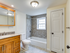 Bathroom with tub/shower and linen closet
