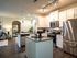 Apartment West Nashville TN - Summit at Nashville West - Large Open-Concept Kitchen with Granite-Style Countertops, Appliances, and White Cabinets.