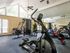 fitness center of elliptical, rower, treadmill and universal weight machine