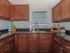 Kitchen with brown wooden cabinets