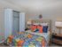 bedroom with closet with folding doors