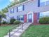 exterior with sidewalk walk up surrounded by green gras