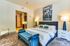 Spacious bedroom large enough to fit a king size bed with luxurious carpet beautiful natural light.