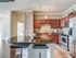 Kitchen, back splash, side by side refrigerators, tile slate entries, town home living.