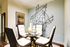 SpaciousDinning Room, 9 Foot Ceilings, Open concept floor plan, faux wood flooring.