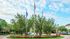 Flagpoles and flowers