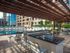Heated Rooftop Infinity-Edge Pool with Aqua Lounge and grilling station.