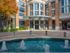 Exterior view of The Ashton with a beautiful water fountain.