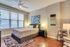 SPACIOUS OPEN BEDROOM. HARDWOOD FLOORS. LARGE WINDOWS. NATURAL LIGHT.
