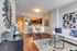Spacious open floor plan, with hardwood flooring.