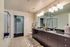 DOUBLE VANITY SINKS. SEPARATE SHOWER AND TUB. AMPLE STORAGE. WALK IN CLOSET..