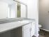 Large Bathroom Vanity Counter with Framer Mirror