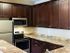 kitchen with granite countertops and microwave