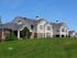 exterior building surrounded by lush lawn