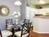 dining and kitchen area with bar seating