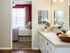 bathroom with large countertop connected to bedroom