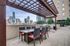 Outdoor grilling space, dinning room table with a view of downtown Dallas