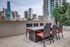 OUTDOOR DINNING SPACE WITH STUNNING VIEW OF DOWNTOWN DALLAS.