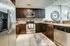 Custom Kitchen, Stainless Steel Appliances,tile Back splash, Spacious sinks.