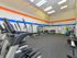 Fitness Center with tread mill, free weights and ellipticals
