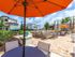 Treviso Grand Apartments - North Venice, Florida outdoor seating with shad pool side