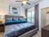 Treviso Grand Apartments - North Venice, Florida master bedroom with walk in closet and ceiling fan