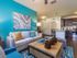 Treviso Grand Apartments - North Venice, Florida open living room looking towards kitchen with island
