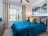 Treviso Grand Apartments - North Venice, Florida bedroom with ceiling fan and carpet