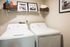 Laundry Room that accommodates full size side by side washer and dryer