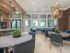 Ridgelake, interior, common room, dining area, tables, chairs, large windows,
