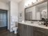 Model bathroom with white countertops