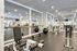 The Henry Apartments, interior, fitness center, weight machines, large mirrors, spacious