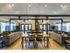 The Henry Apartments, interior, clubhouse, spacious seating areas, fire place, tables and chairs, large windows, natural light