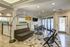 The Henry Apartments, interior, spacious room, seating, large windows, door to deck,
