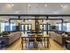 The Henry Apartments, interior, clubhouse, spacious seating areas, fire place, tables and chairs, large windows, natural light