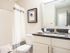 Granite countertops on the vanity in the bathroom