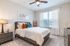 San Mateo Apartments Kissimmee Florida bedroom with carpeted floors and ceiling fan