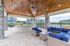 San Mateo Apartments Kissimmee Florida outdoor kitchen with grills and seating area