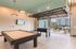 San Mateo Apartments Kissimmee Florida gaming lounge with pool table and foosball table
