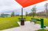 San Mateo Apartments Kissimmee Florida outdoor pet park with agility equipment, benches and water fountain