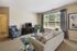 Living room with sofa, coffee table and TV