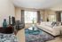 Family room with sofa, coffee table and TV