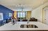 Beautiful open kitchen. Custom kitchen Cabinets, designer tile backsplash Stainless steel GE appliance package, Premium quartz countertops.Spacious Living Room, 9 Foot Ceilings, Open concept floor plan, with natural light. Ceiling fan and f