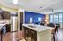 Beautiful open kitchen. Custom kitchen Cabinets, designer tile backsplash Stainless steel GE appliance package, Premium quartz countertops. Spacious Living Room, 9 Foot Ceilings, Open concept floor plan, with natural light. Ceiling fan and