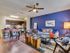 Beautiful open kitchen. Custom kitchen Cabinets, designer tile backsplash Stainless steel GE appliance package, Premium quartz countertops.Spacious Living Room. Open concept floor plan, with natural light. Ceiling fan and faux wood floorin